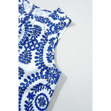Trendsi navy blue sleeveless top for women with white background and floral pattern