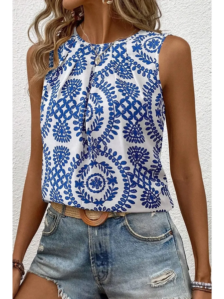 Trendsi navy blue sleeveless top for women with white floral pattern paired with denim shorts