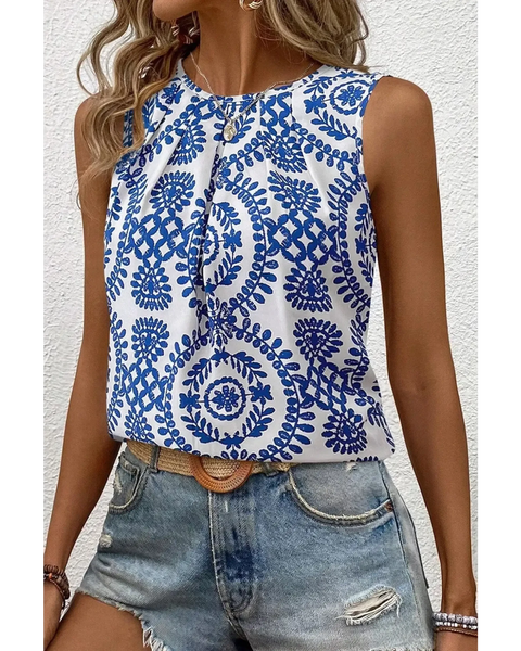 Trendsi navy blue sleeveless top for women with white floral pattern paired with denim shorts
