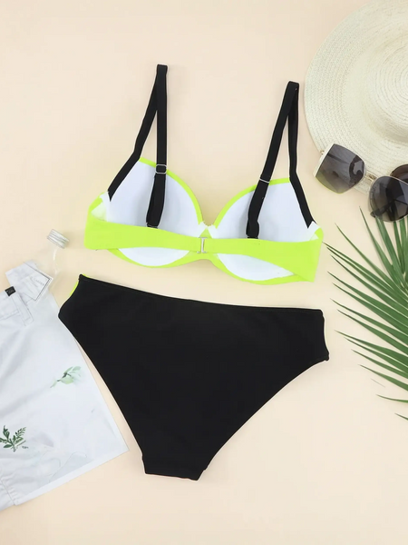 Trendsi neon bikini set with black bottoms and neon yellow top with black straps styled with white shorts hat and sunglasses
