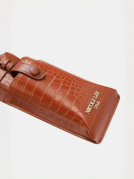 Brown crocodile pattern belt bag with buckle strap and gold Nicole Lee USA logo