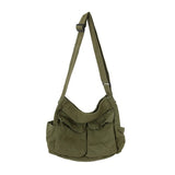 Olive green Nova Oversized Canvas Messanger Bag with multiple pockets and adjustable shoulder strap