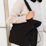 Babe Beachwear Nylon Lightweight Weekender Gym Bag in black carried on shoulder