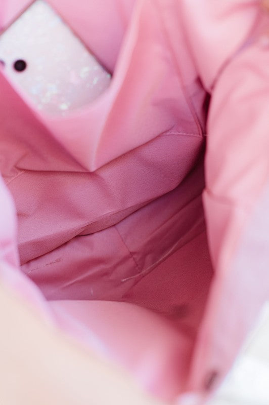 Interior view of Babe Beachwear Nylon Lightweight Weekender Gym Bag in pink showing inner pocket and lining