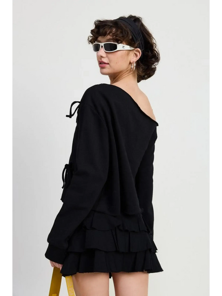 Emory Park Off Shoulder Distressed Top black short sleeve with ruffle hem worn by model