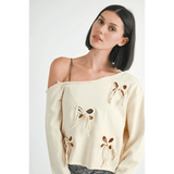 Emory Park Off Shoulder Distressed Top in beige with bow cutout details on long sleeves