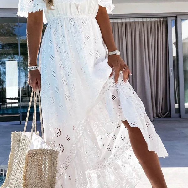 Babe Beachwear off shoulder eyelet maxi dress in white with floral cutout details and ruffled hem