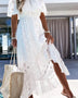 Babe Beachwear off shoulder eyelet maxi dress in white with floral cutout details and ruffled hem