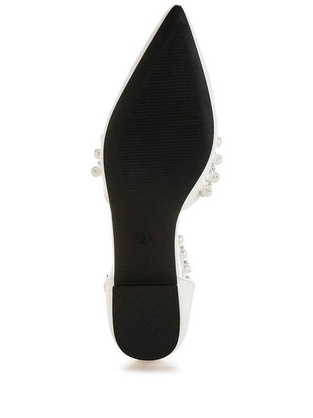 Bottom view of Rag Company pearl embellished summer sandals with a black sole and pointed toe