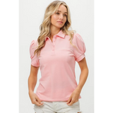 Pink puff sleeve shirt for women by Trendsi with collar and button detail, styled with white shorts