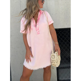 Babe Beachwaer short sleeve tunic midi dress plus size in light pink with frayed hem styled with a woven bag