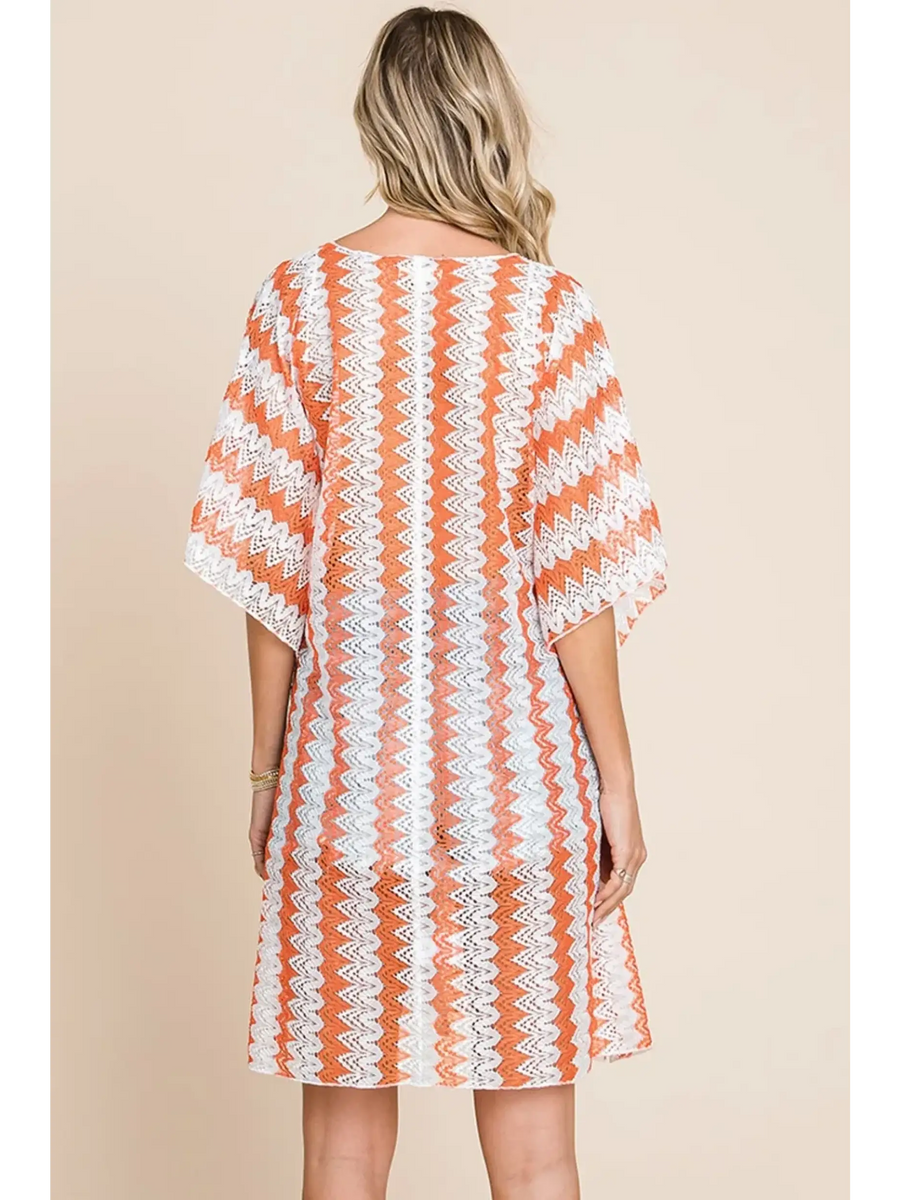 Back view of Babe Beachwear pink white strip mesh coverup with zigzag pattern and loose sleeves
