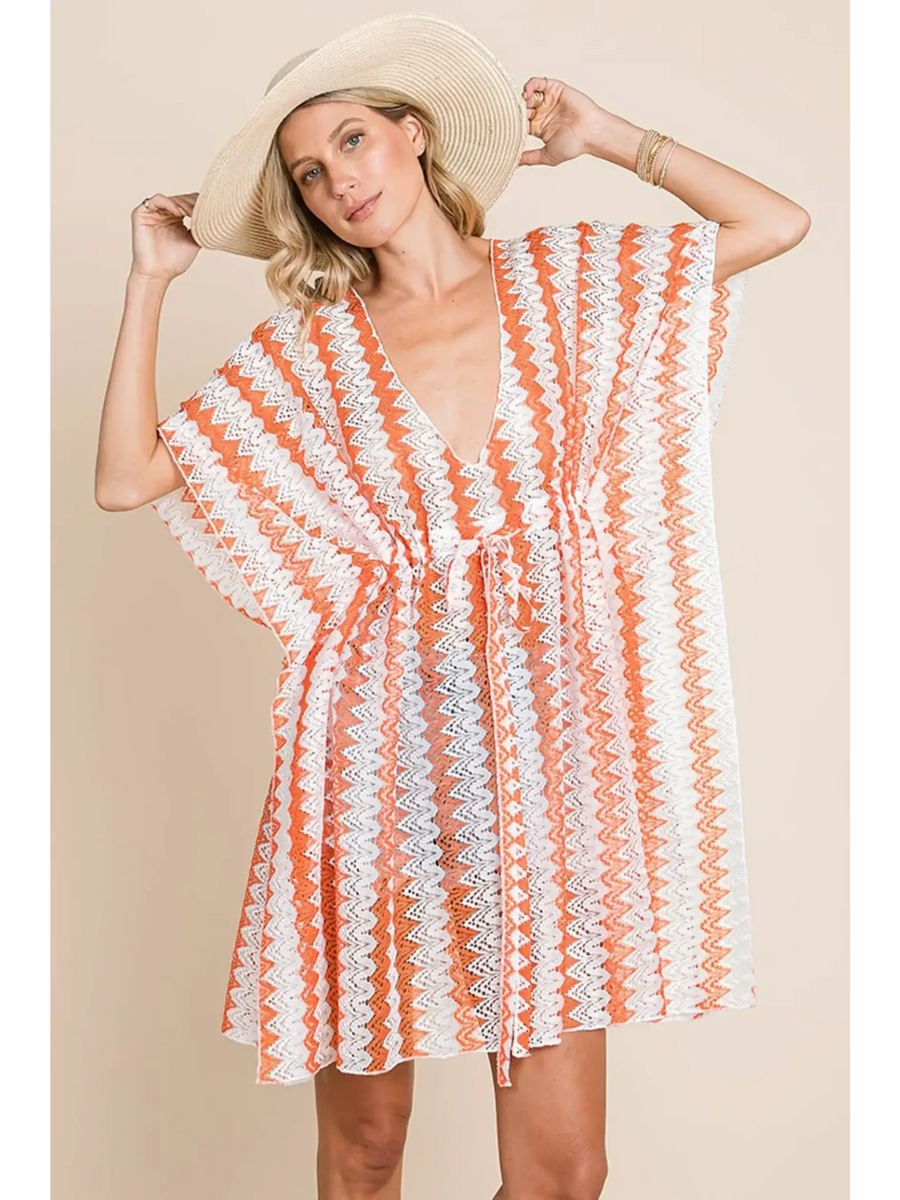 Babe Beachwear pink white strip mesh coverup with a zigzag pattern worn with wide-brim hat