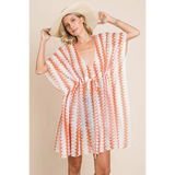 Babe Beachwear pink white strip mesh coverup with a zigzag pattern worn with wide-brim hat
