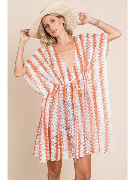 Babe Beachwear pink white strip mesh coverup with a zigzag pattern worn with wide-brim hat