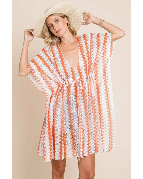 Babe Beachwear pink white strip mesh coverup with a zigzag pattern worn with wide-brim hat