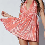 Babe Beachwear pleated halter mini cocktail dress in shiny pink with deep V-neck and flowy skirt