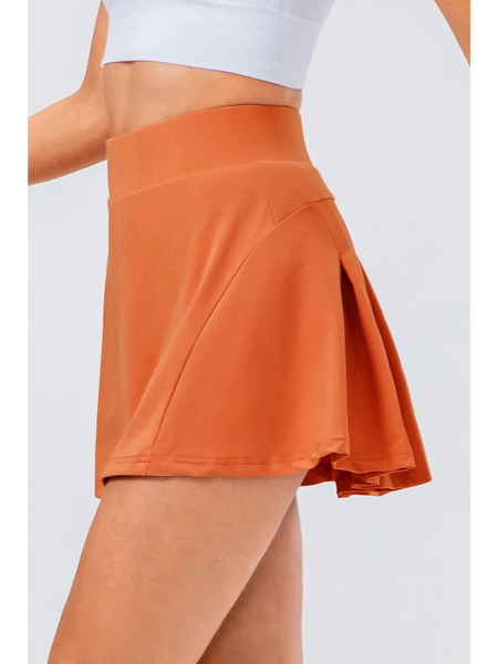 Babe Beachwear pleated tennis skirt with pockets in burnt orange and high waist design