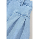 Close-up of light blue pleated wide leg denim shorts by Trendsi showing detailed stitching and belt loop