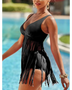 Beach Babes plus size fringe swim dress in black worn by a woman by the pool