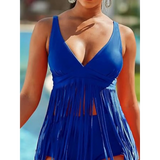 Beach Babes plus size fringe swim dress in vibrant blue with deep V-neck and flowing fringe detailing