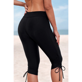 Beach Babes black plus size swim pants with ruched drawstrings on the legs for a comfortable fit