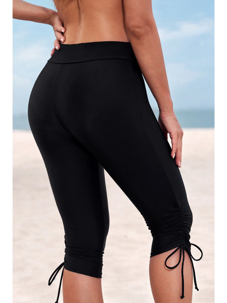 Beach Babes black plus size swim pants with ruched drawstrings on the legs for a comfortable fit