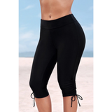 Black Beach Babes plus size swim pants with adjustable ties and mid-calf length for comfortable beachwear