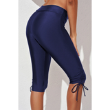 Beach Babes navy plus size swim pants with drawstring detail on knees and mid-calf length