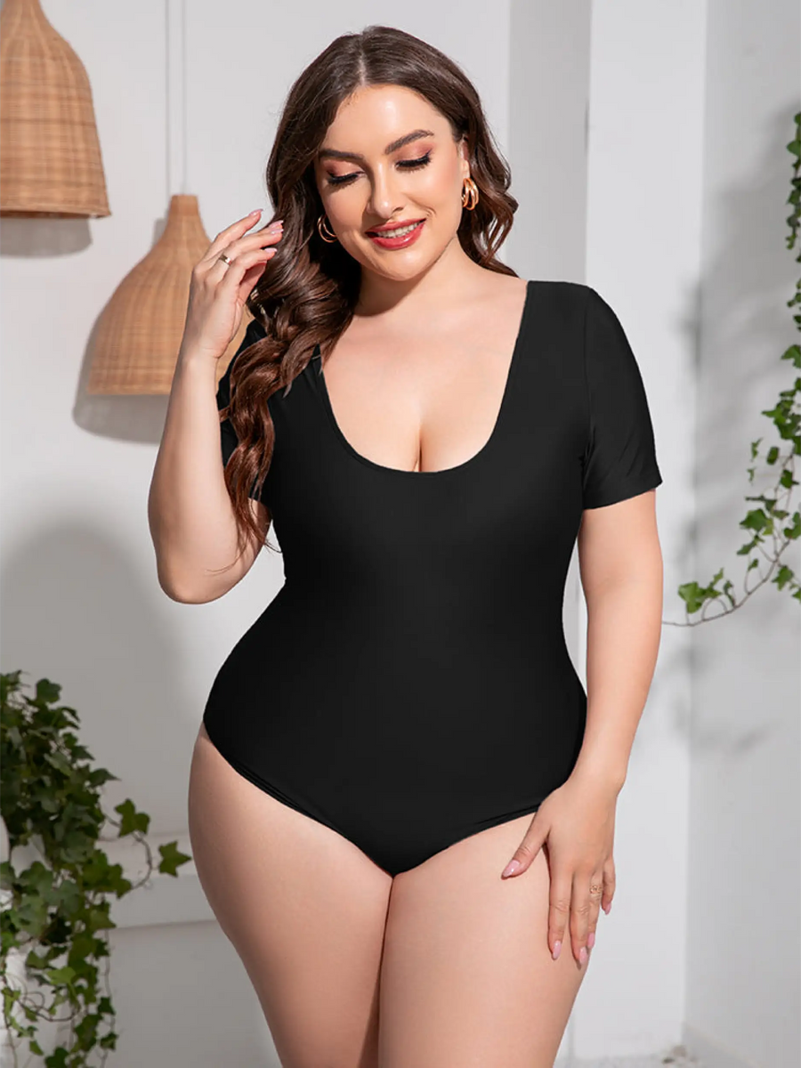 Beach Babes plus size swimsuit with sleeves in black featuring a scoop neckline and short sleeves1