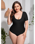 Beach Babes plus size swimsuit with sleeves in black featuring a scoop neckline and short sleeves1