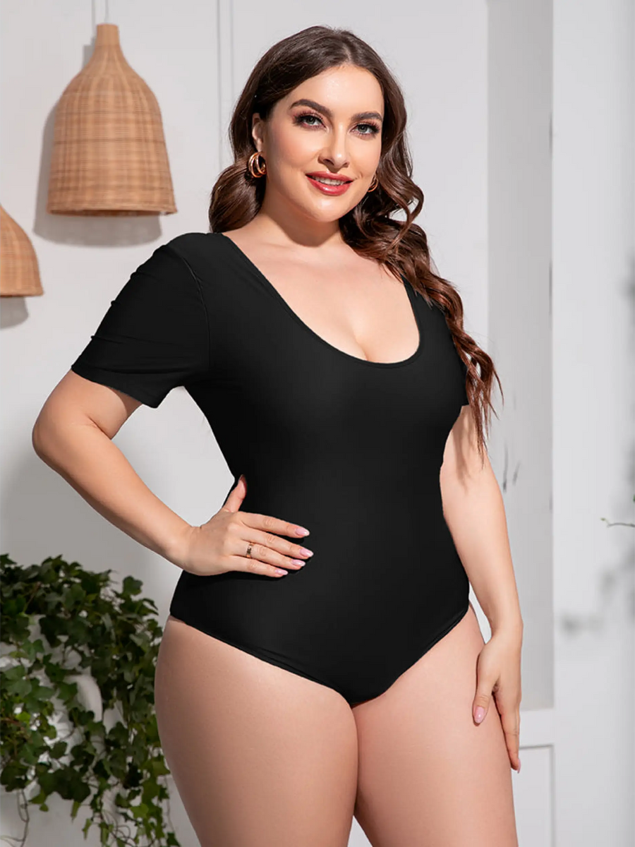 Beach Babes plus size swimsuit with sleeves in black featuring a scoop neckline and short sleeves side view