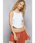 Trendsi white tank top with pink trim sleeveless top worn by model with casual pants