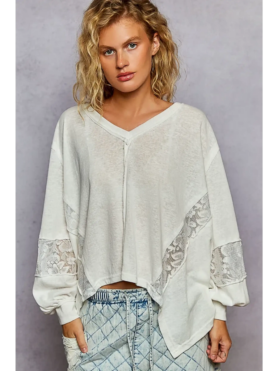 Trendsi long sleeve lace v-neck beach top in white with lace detail on sleeves and relaxed fit