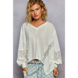 Trendsi long sleeve lace v-neck beach top in white with lace detail on sleeves and relaxed fit