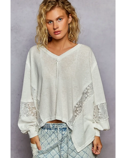 Trendsi long sleeve lace v-neck beach top in white with lace detail on sleeves and relaxed fit