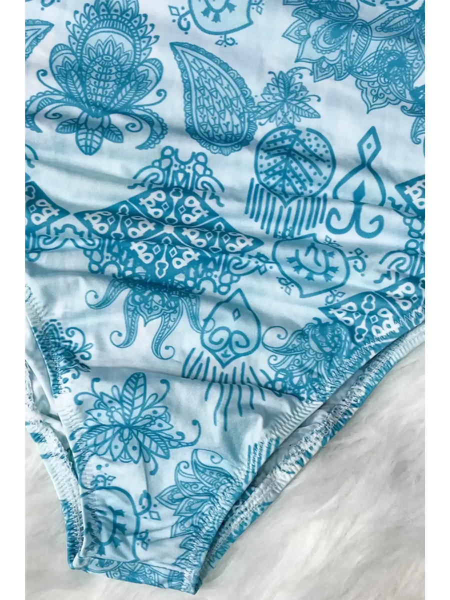 Beach Babes sun protective swimwear for women in blue and white with intricate floral and abstract patterns