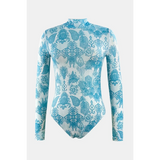 Beach Babes sun protective swimwear for women with long sleeves and blue floral pattern