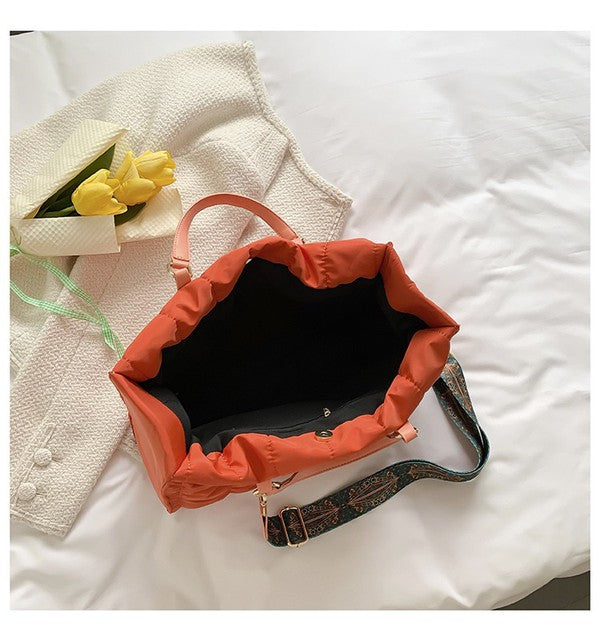 Babe Beachwear Puffer Tote Bag With Shoulder Straps in orange with spacious interior and patterned strap