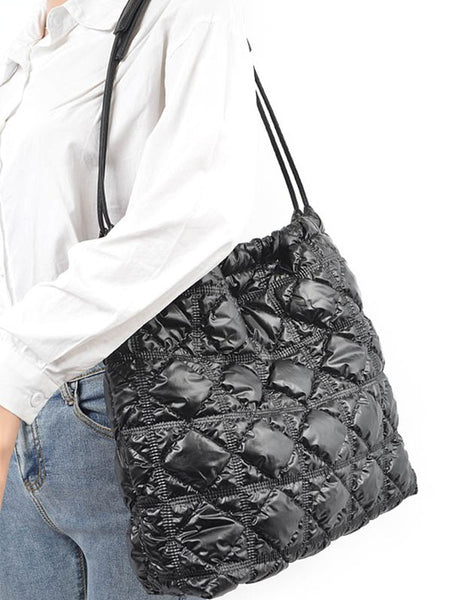 Babe Beachwear Quilted Designer Style Puffer Tote black bag worn over shoulder with quilted pattern