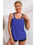 Trendsi racerback tankini swim top in blue with patterned straps worn by smiling woman
