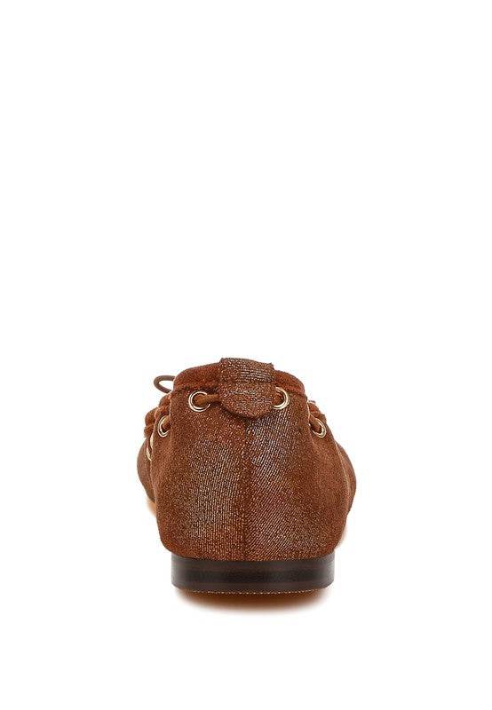 Rag Company brown bow ballerina flats for women shown from back view with textured finish