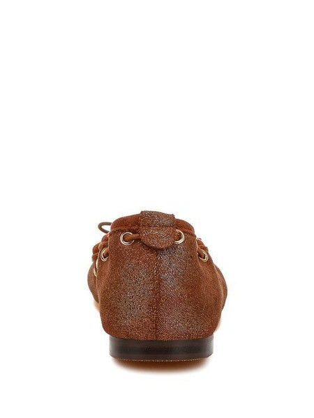 Rag Company brown bow ballerina flats for women shown from back view with textured finish