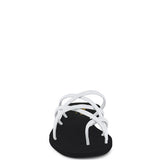 Babe Beachwear chic metallic flat slip-ons with white crisscross straps and black sole
