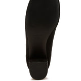 Bottom sole view of Rag Company genuine suede dressy loafers in black with textured grip