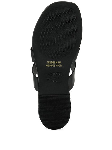 Black sole view of Babe Beachwear women's summer slip-on sandals with textured grip