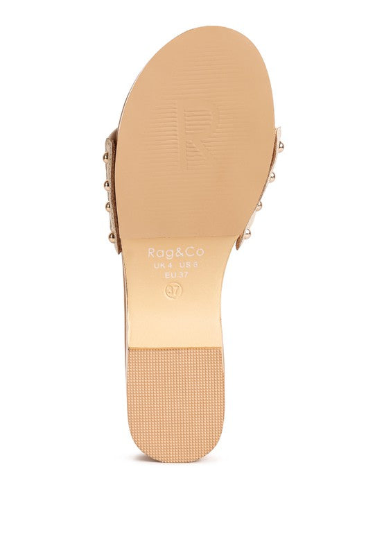Bottom view of Rag Company clog wooden sandals showing sole texture and size details