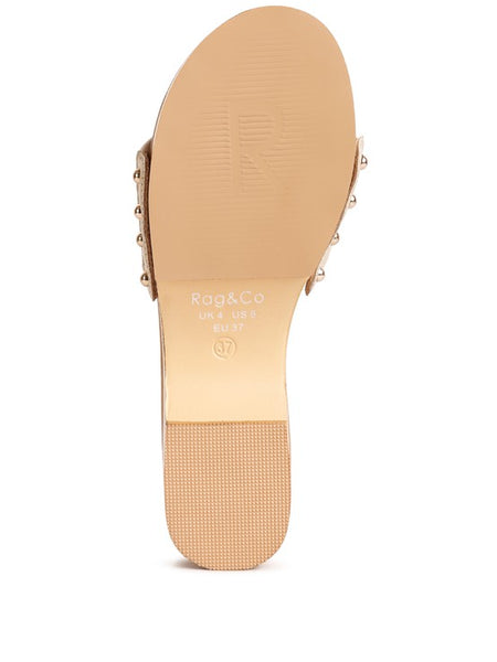 Bottom view of Rag Company clog wooden sandals showing sole texture and size details