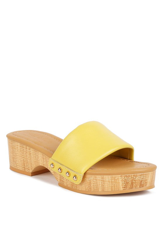 Rag Company yellow clog wooden sandals with studded details and wooden platform heel