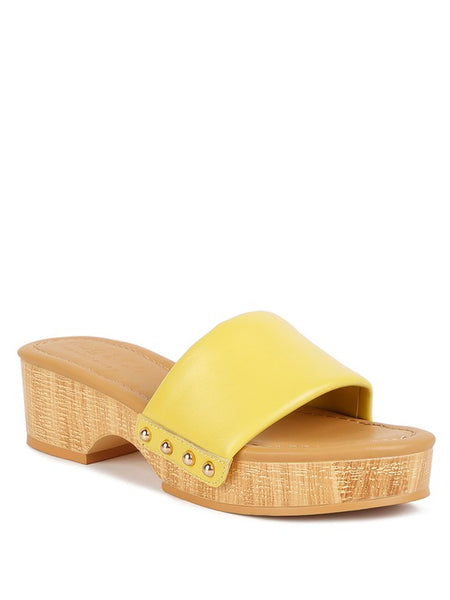 Rag Company yellow clog wooden sandals with studded details and wooden platform heel